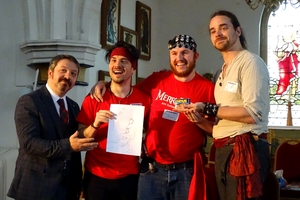 Frodo presents the winner of the fan art drawing competition with a glittering prize - a can of premium spam.